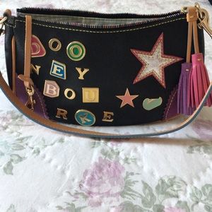 Dooney and Bourke small crescent bag.